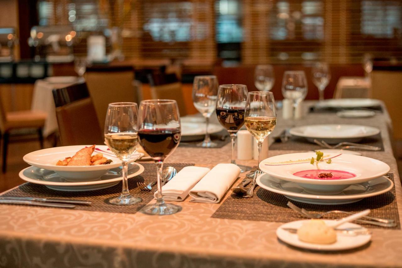 Mds Hotel Calama Exterior foto A table set for dinner