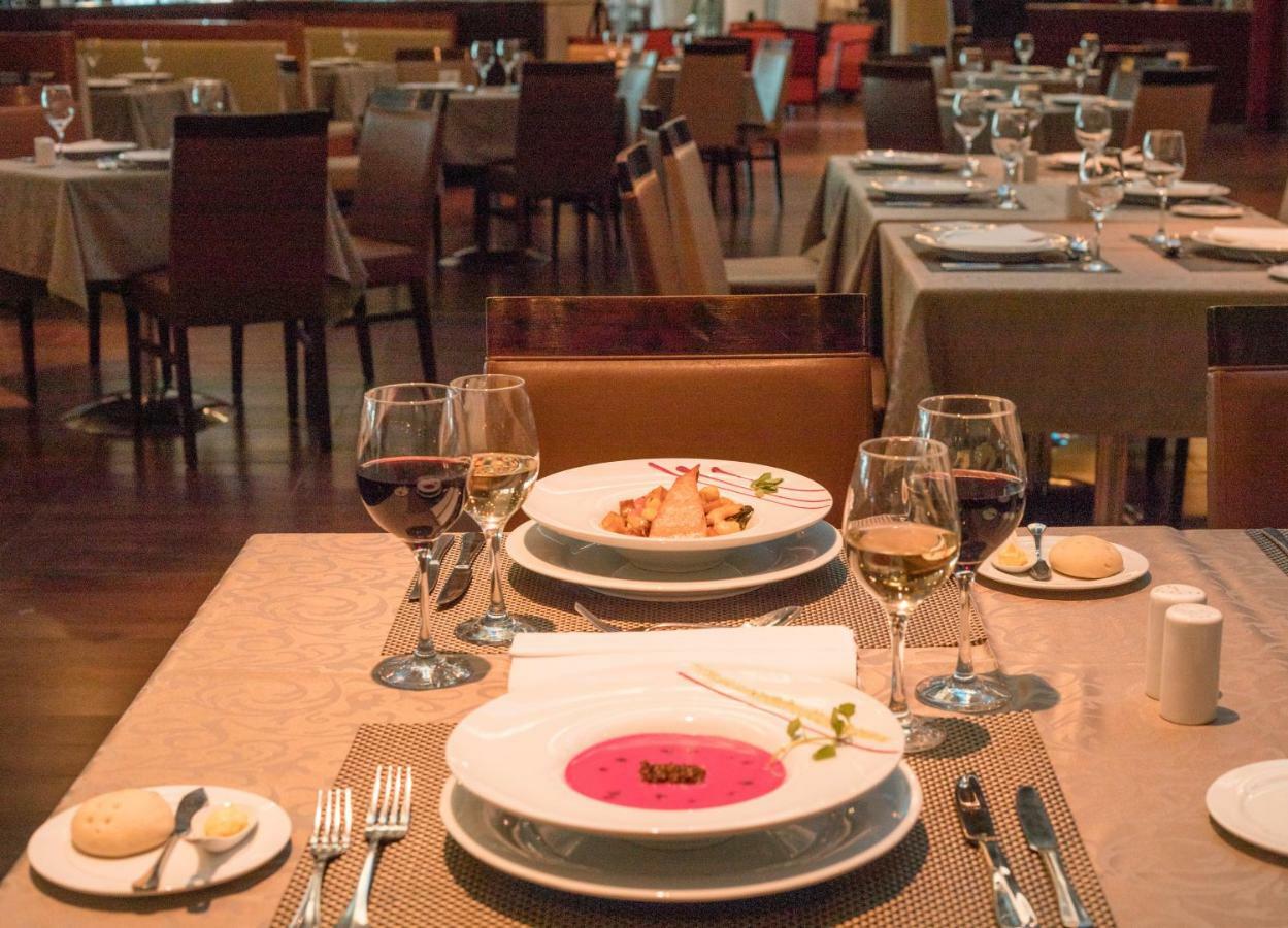 Mds Hotel Calama Exterior foto A table set for dinner