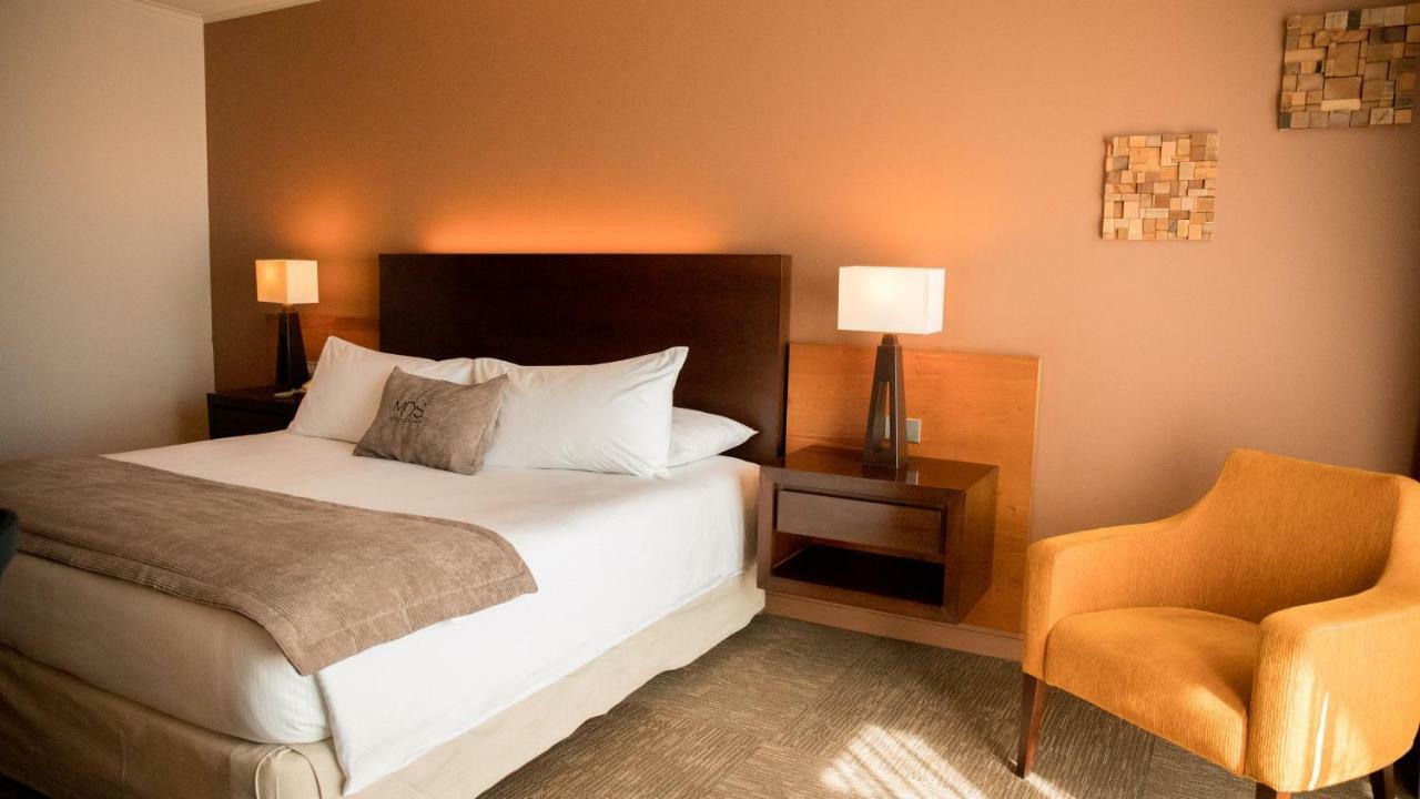 Mds Hotel Calama Exterior foto A bedroom at the hotel